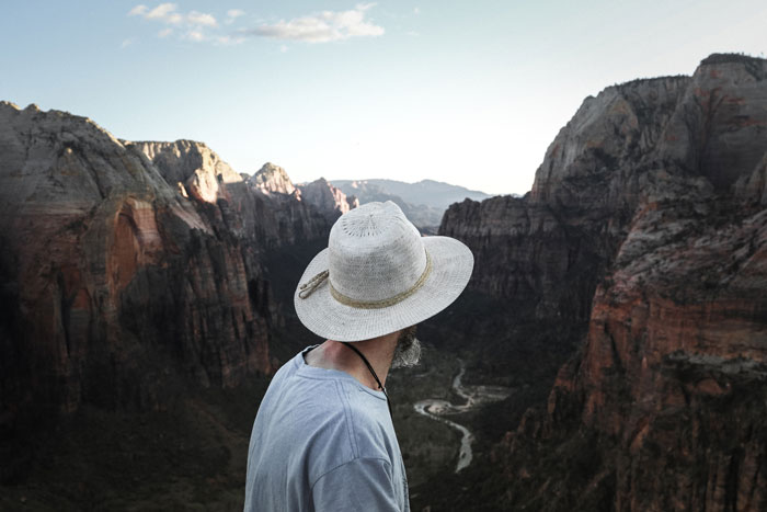 Traveler looking across a dramatic landscape