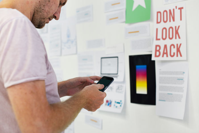 Designer testing a mobile interface